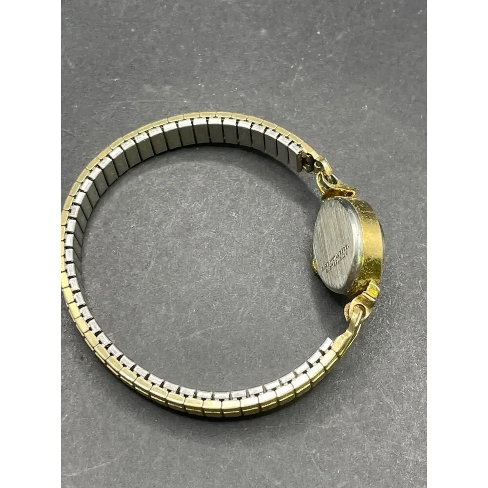 Vintage Timex Watch Women's Gold Tone Round Stretch Band Manual Wind Up 16mm